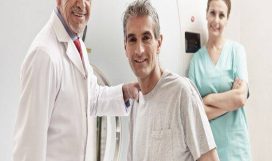 Happy,Senior,Doctor,With,His,Male,Patient,At,Ct,Scanner
